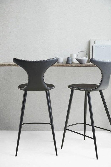 Dolphin Barstol, vintage sort kunstlæder, runde sorte ben - UNOLIVING.COM